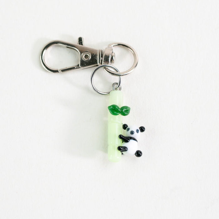 Glass Puffco charm featuring a playful panda design for setup styling